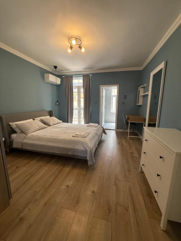 Postel nebo postele na pokoji v ubytování Chernomorets Apartment