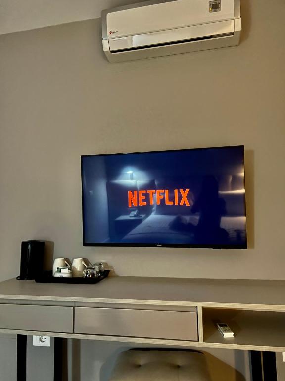 TV a/nebo společenská místnost v ubytování Hotel President