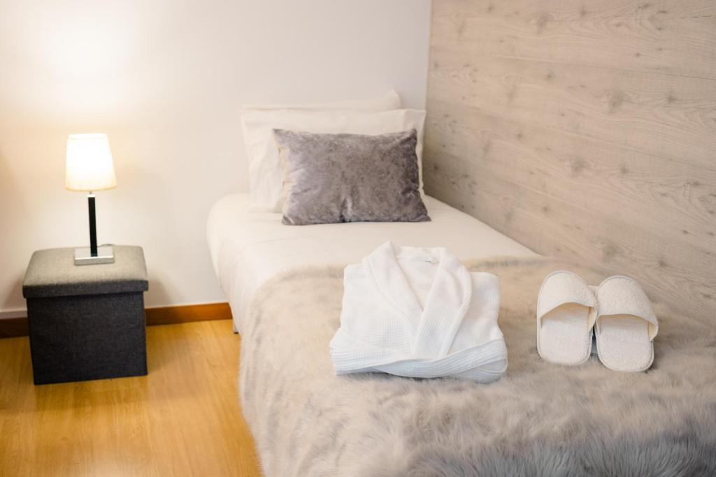 Postel nebo postele na pokoji v ubytování Lousã Varandas House