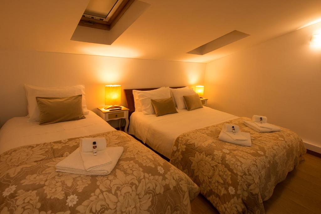 Postel nebo postele na pokoji v ubytování Lousã Varandas House