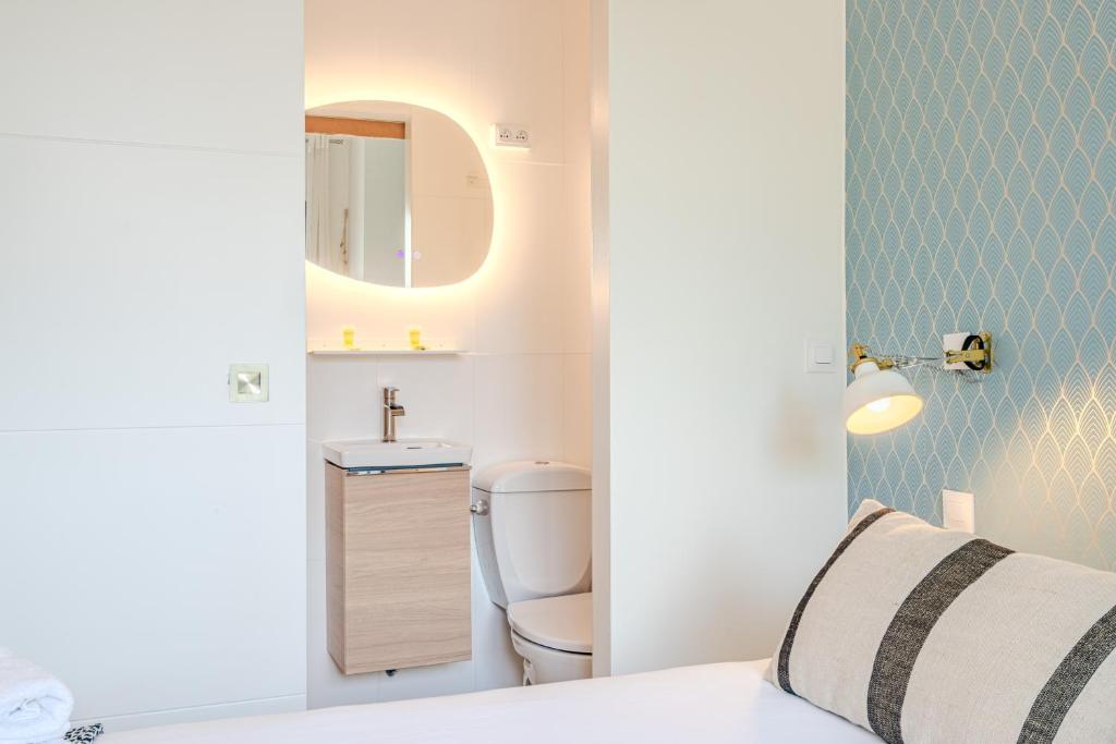 Postel nebo postele na pokoji v ubytování Single Fin Hotel & Lodge
