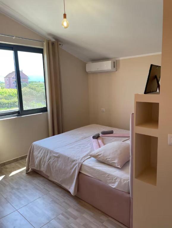 Łóżko lub łóżka w pokoju w obiekcie Hotel Villa Ballkan