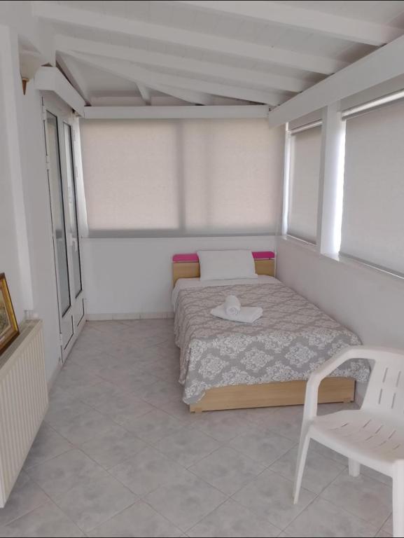 Postel nebo postele na pokoji v ubytování Dennis House