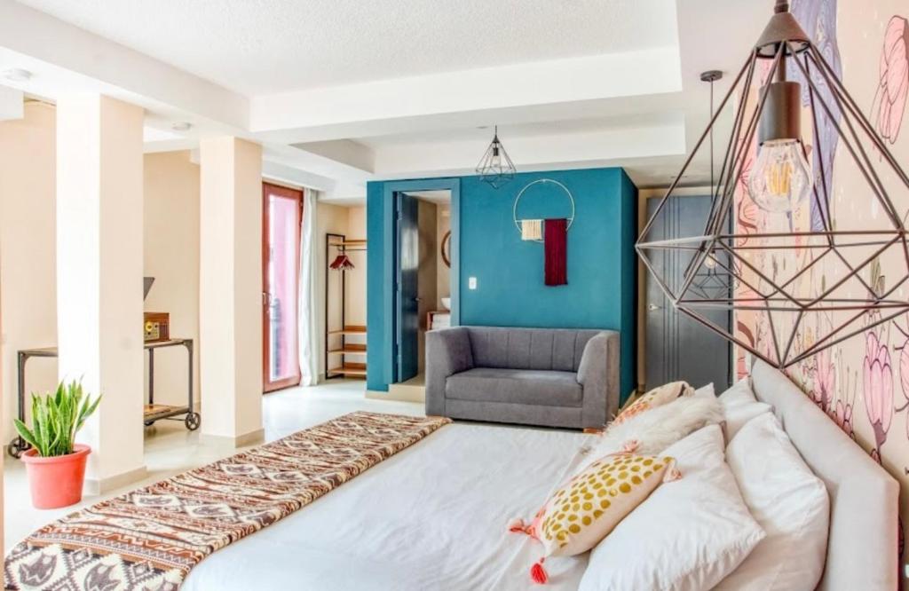 Postel nebo postele na pokoji v ubytování Hotel Brio Centro