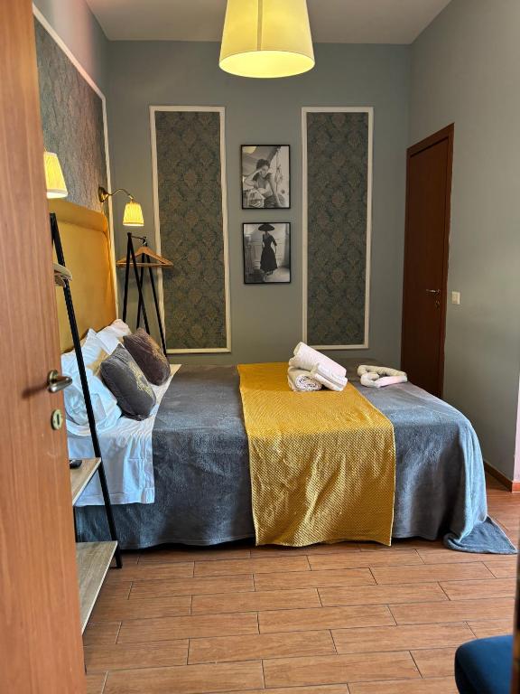 Postel nebo postele na pokoji v ubytování Hotel magnolia 1000 mt dal casello