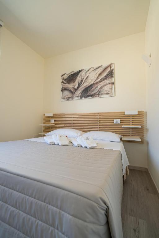 Postel nebo postele na pokoji v ubytování Rooms & Breakfast Centrale