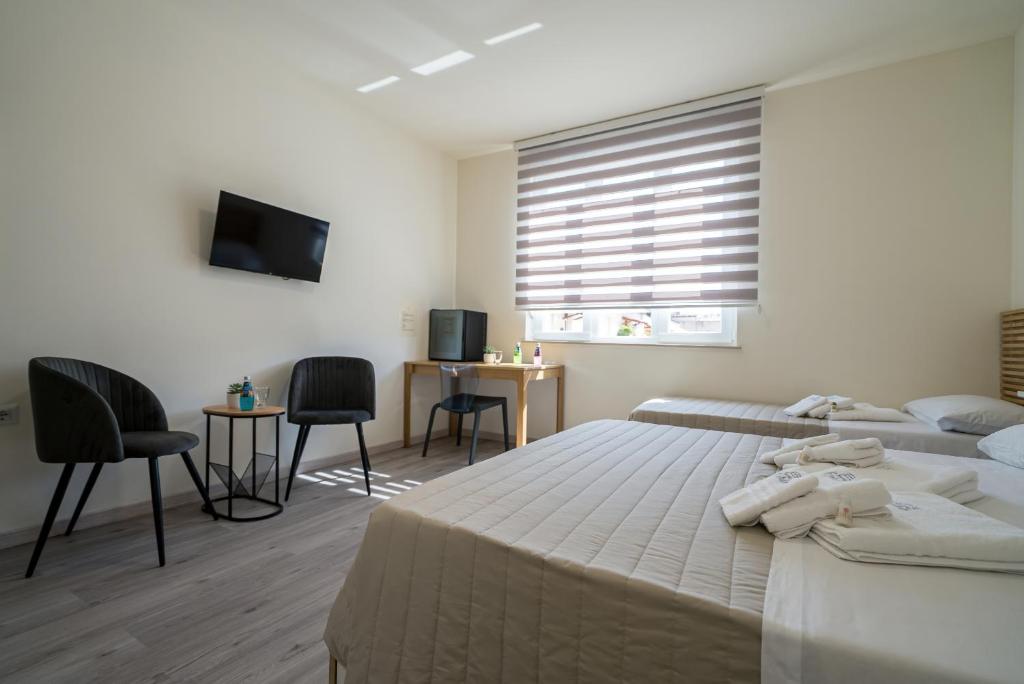Postel nebo postele na pokoji v ubytování Rooms & Breakfast Centrale