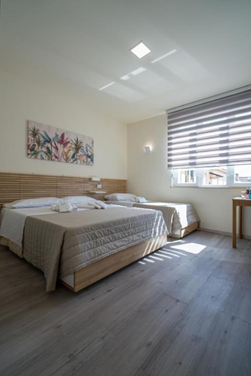 Postel nebo postele na pokoji v ubytování Rooms & Breakfast Centrale