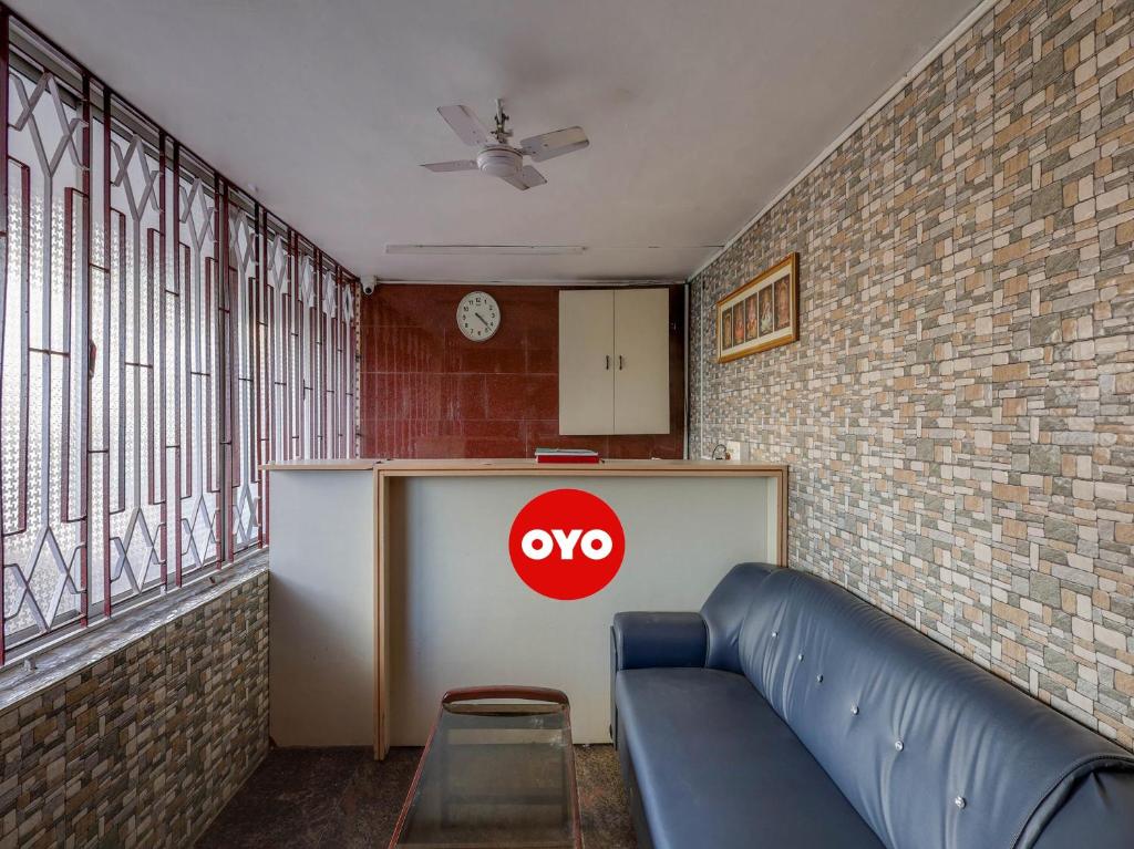 Posezení v ubytování Super Hotel O Vsv Guest House Maduravoyal