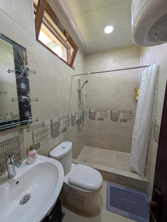 Koupelna v ubytování Guest House Roba