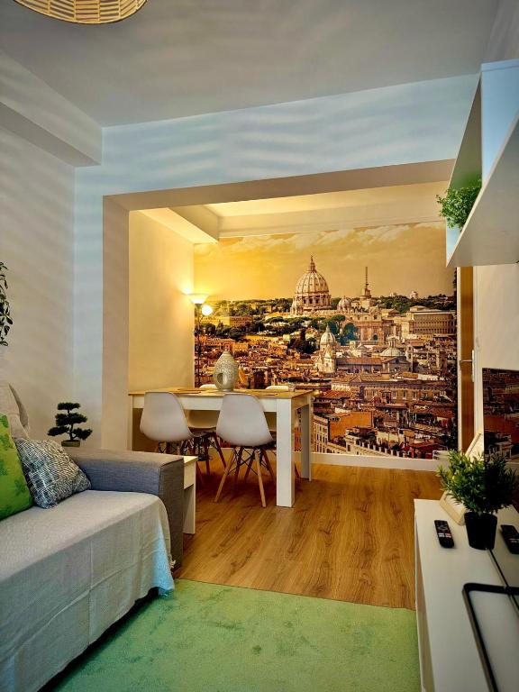 a living room with a wall mural of a city at Roma Bella in El Burgo de Osma
