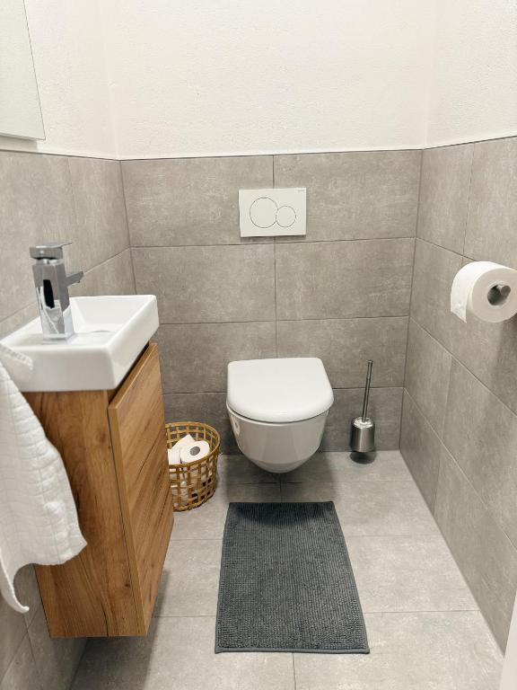 Koupelna v ubytování Apart Pair im Dorf