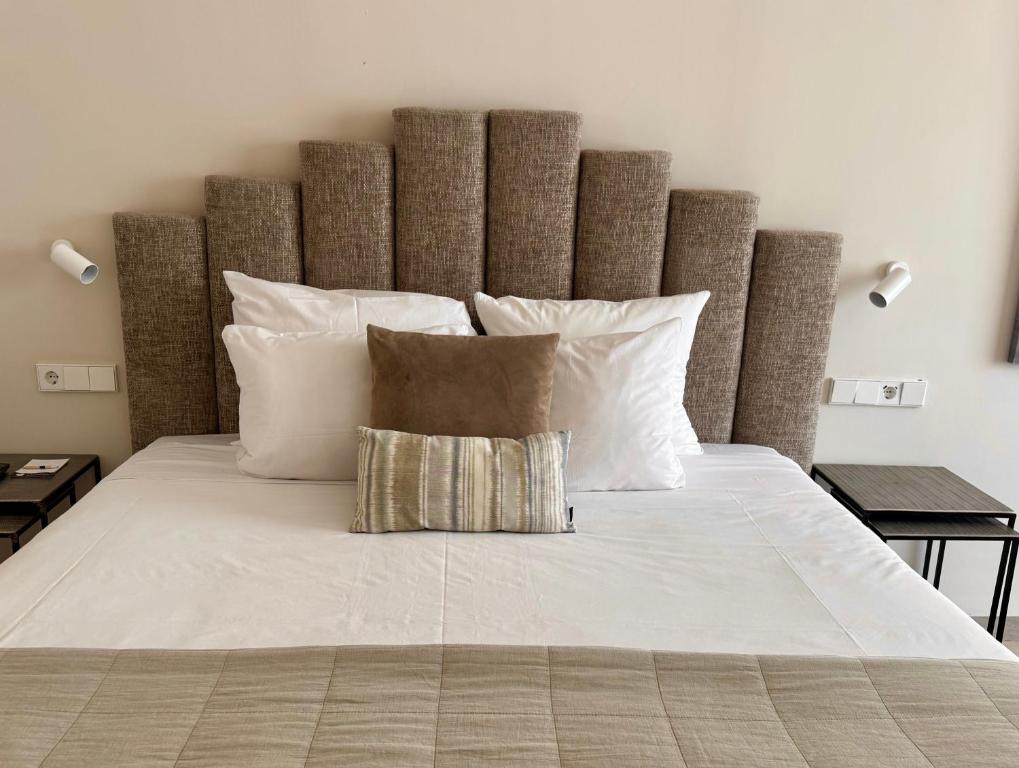 Posteľ alebo postele v izbe v ubytovaní Comfy Studios Hotel