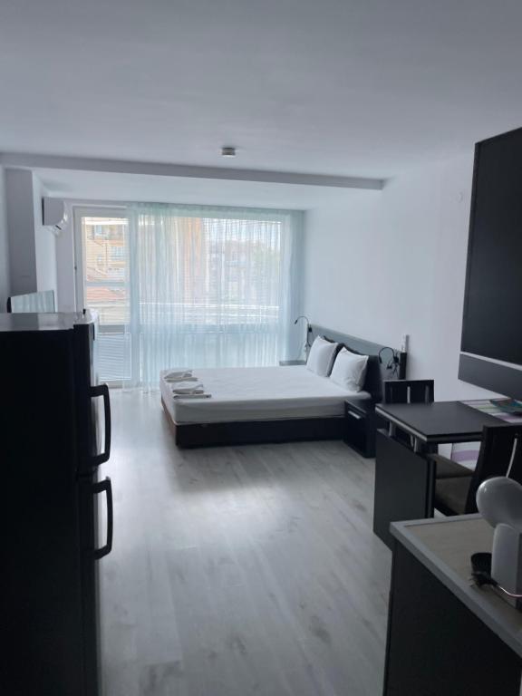 A bed or beds in a room at Day Dream