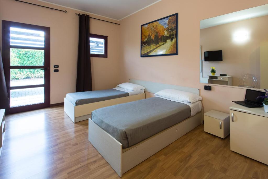 Postel nebo postele na pokoji v ubytování Break Hotel