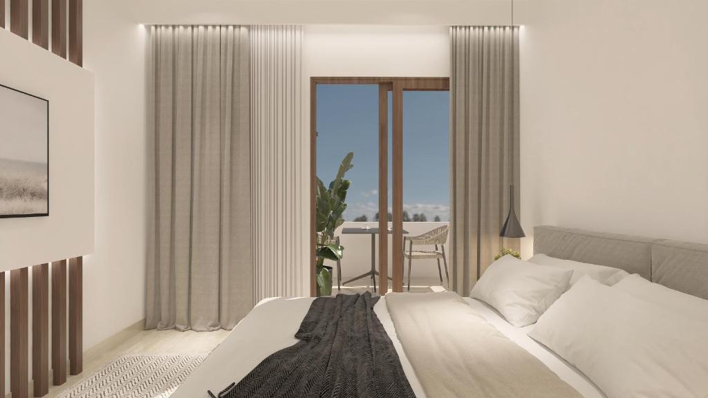 Postel nebo postele na pokoji v ubytování Hotel Sphinx