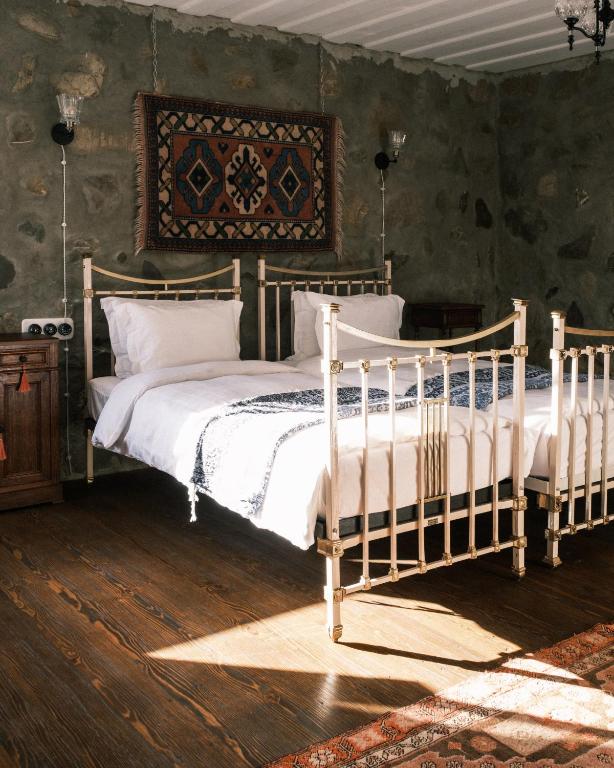 Postel nebo postele na pokoji v ubytování Anapea Village