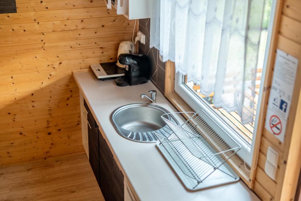 Kuchyňa alebo kuchynka v ubytovaní Apartamenty Kompas