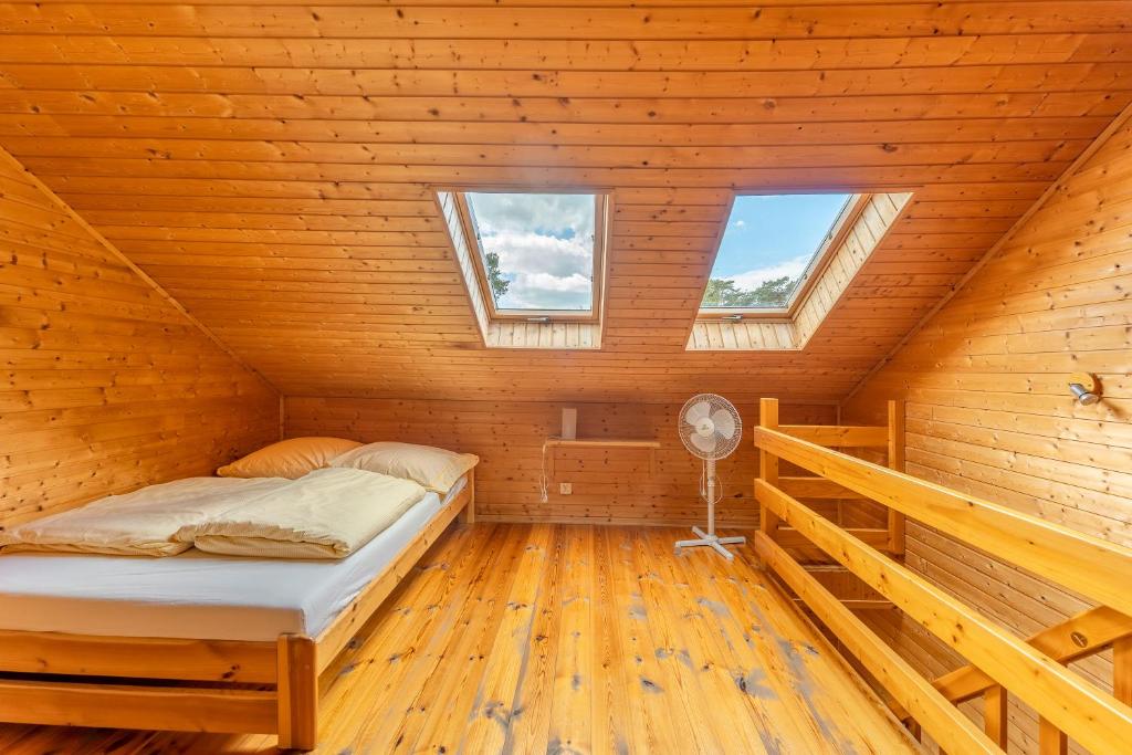 Posteľ alebo postele v izbe v ubytovaní Apartamenty Kompas