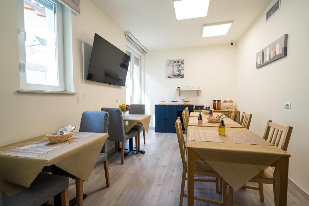 TV a/nebo společenská místnost v ubytování Rooms & Breakfast Centrale
