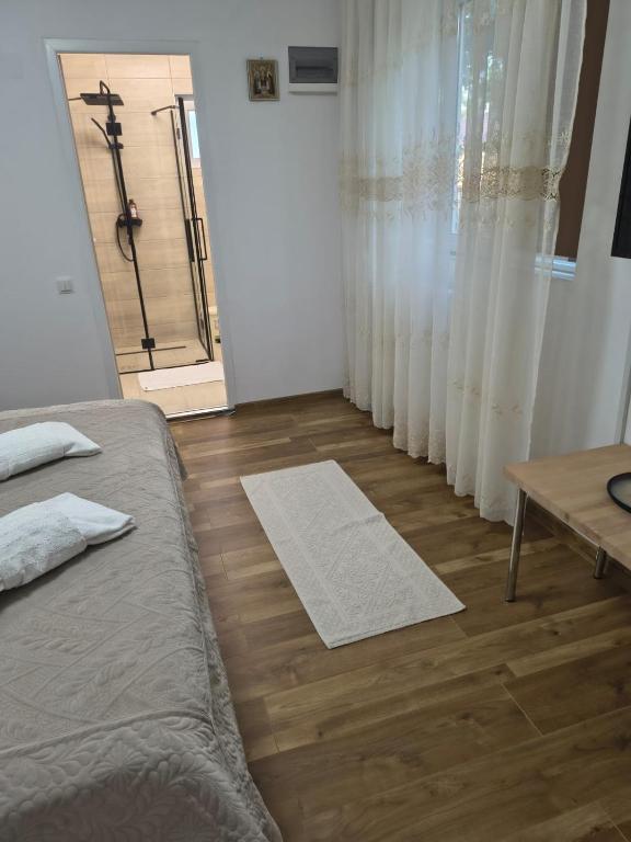 Postel nebo postele na pokoji v ubytování IMPERIUM DK VILLA