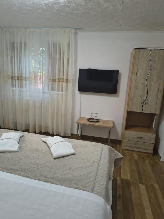 Postel nebo postele na pokoji v ubytování IMPERIUM DK VILLA