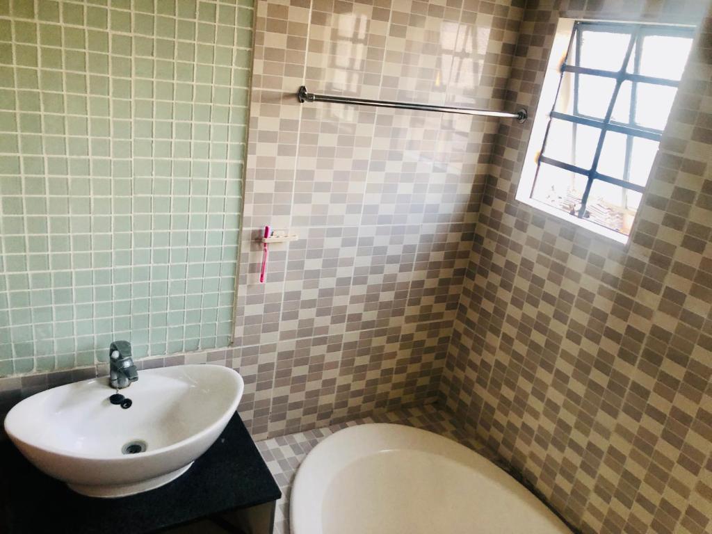 Koupelna v ubytování Secret-Meadow Accommodation