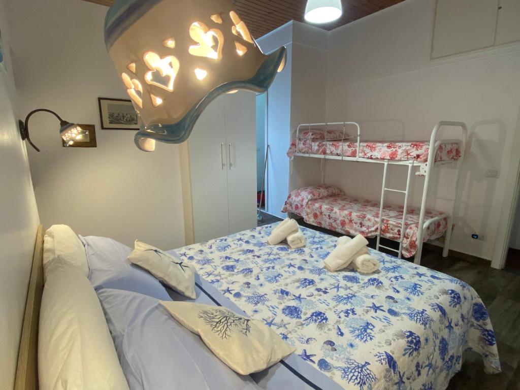Posteľ alebo postele v izbe v ubytovaní Lipari Centro Storico 5 mins from port Casa Celeste