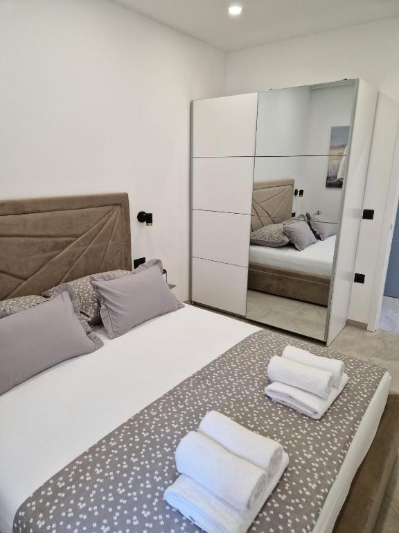Posteľ alebo postele v izbe v ubytovaní Lavanda Centar Makarska
