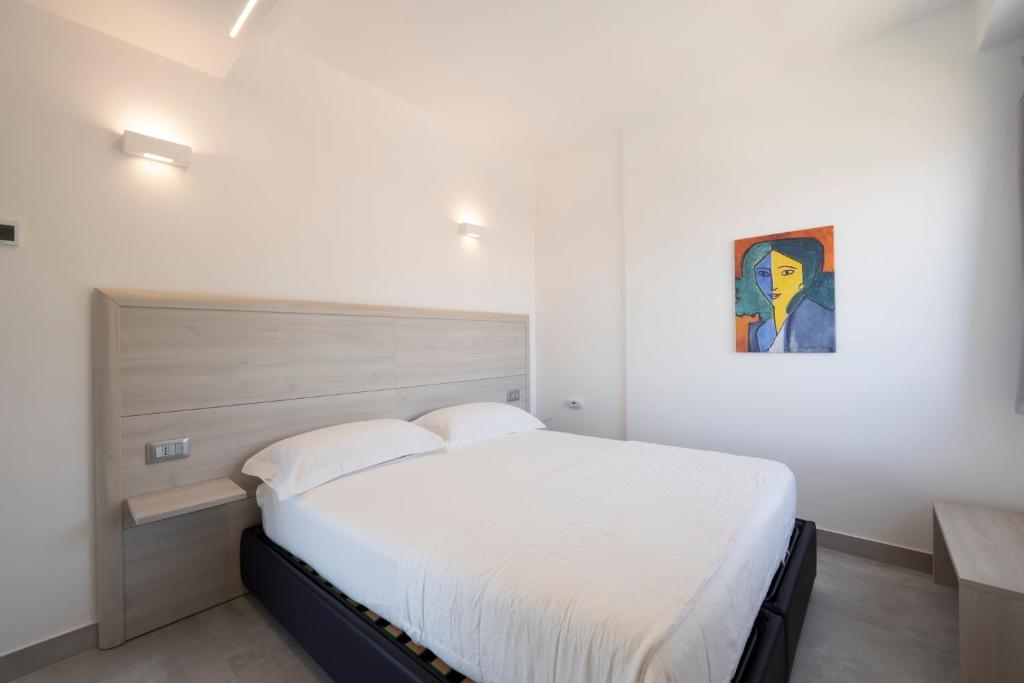 Posteľ alebo postele v izbe v ubytovaní Residenza Timpa Janca