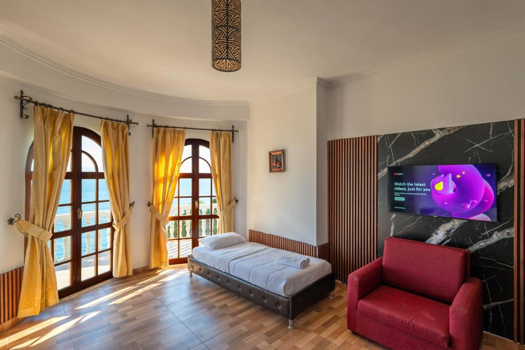 Postel nebo postele na pokoji v ubytování Monte Cristo Hotel - Rooftop Pool
