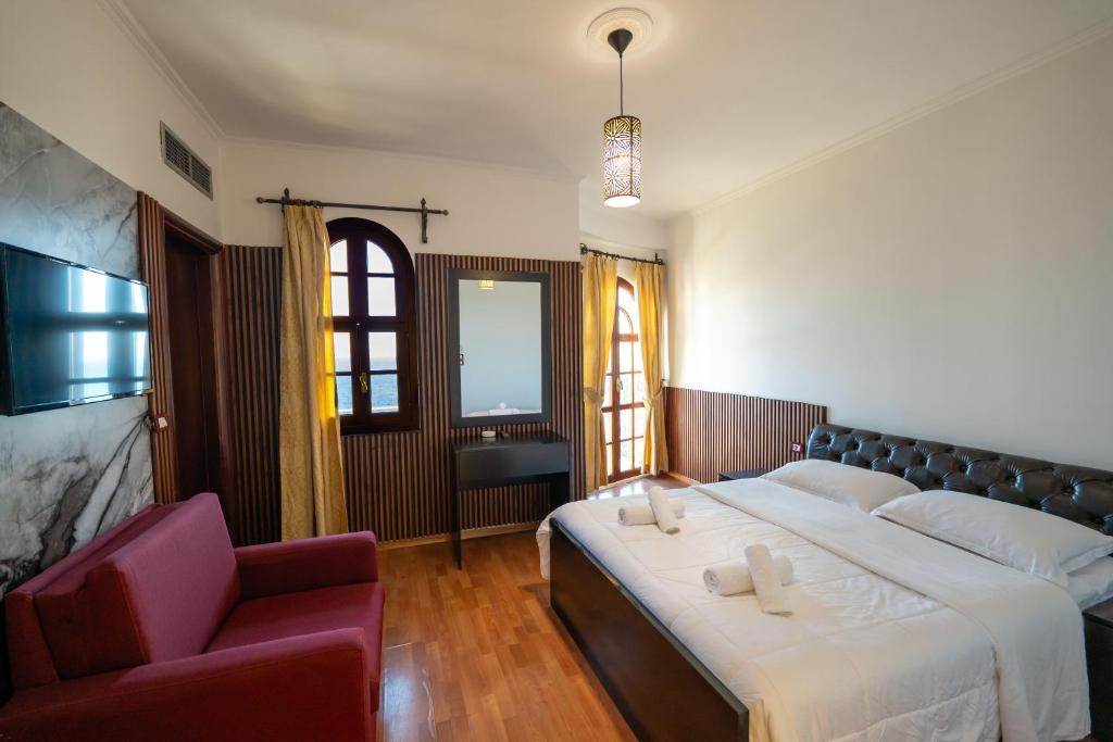 Postel nebo postele na pokoji v ubytování Monte Cristo Hotel - Rooftop Pool