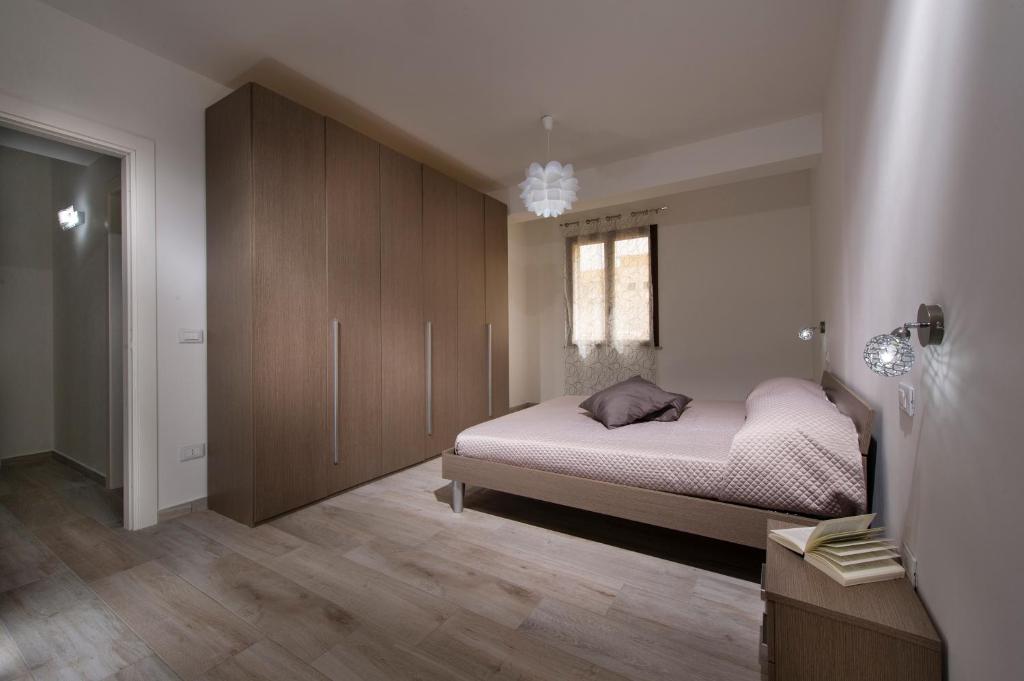 Posteľ alebo postele v izbe v ubytovaní La Suite Di Tyche