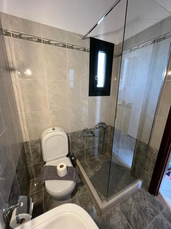 Łazienka w obiekcie Girogiali Apts