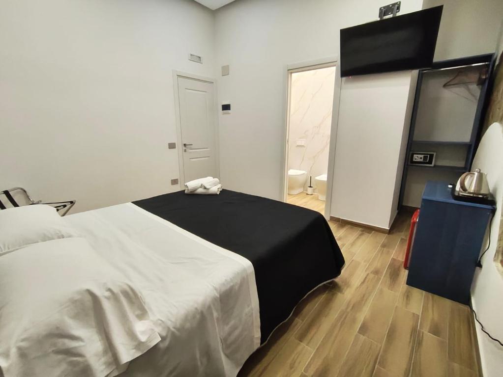 Posteľ alebo postele v izbe v ubytovaní Maison Arena