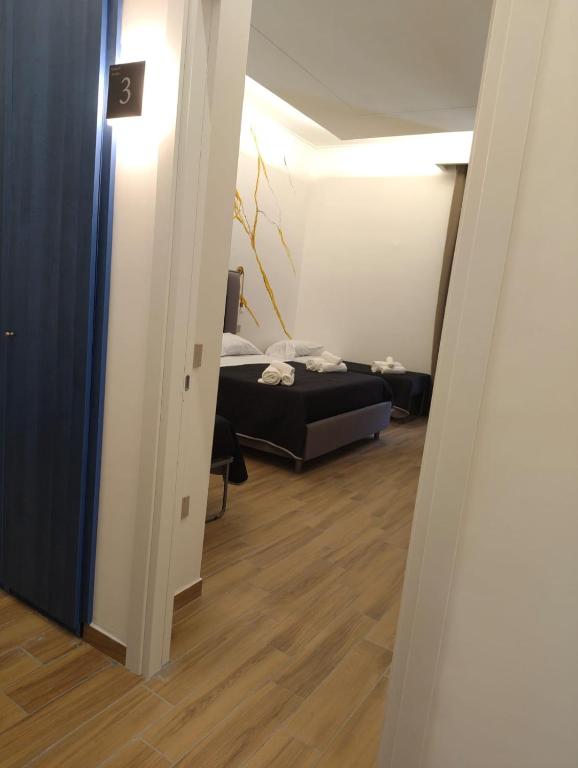 Posteľ alebo postele v izbe v ubytovaní Maison Arena