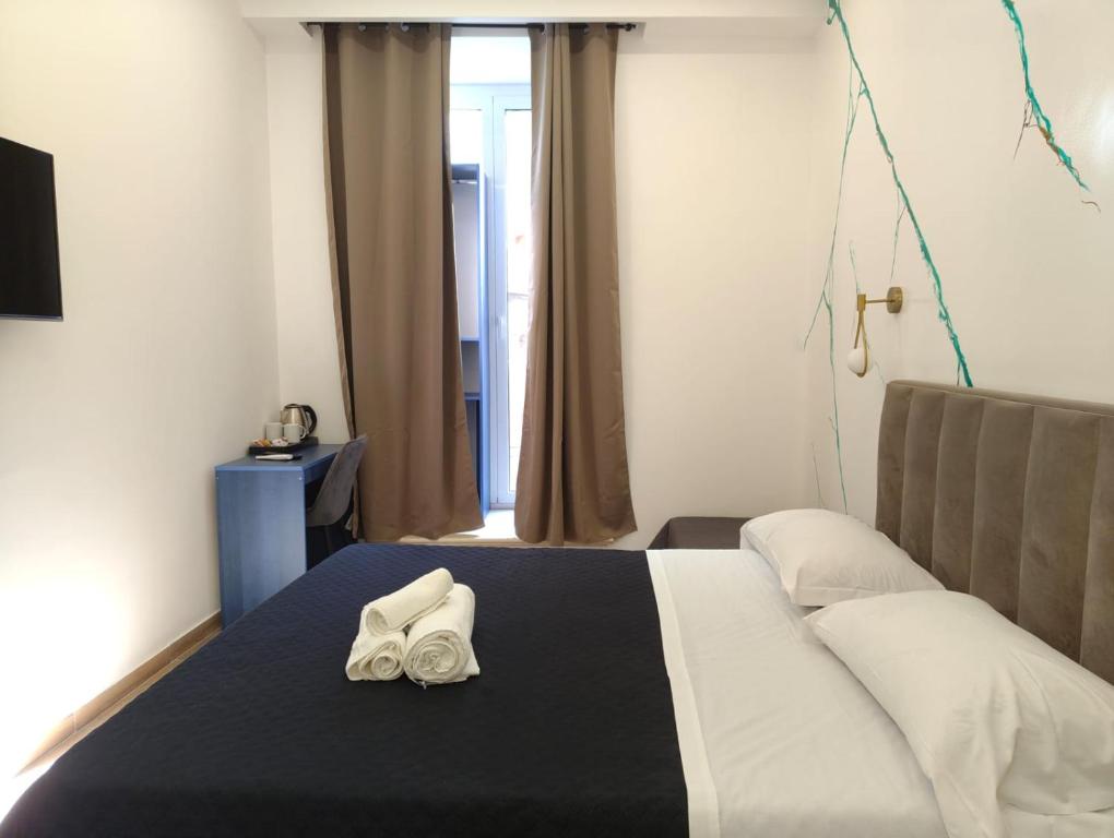 Posteľ alebo postele v izbe v ubytovaní Maison Arena