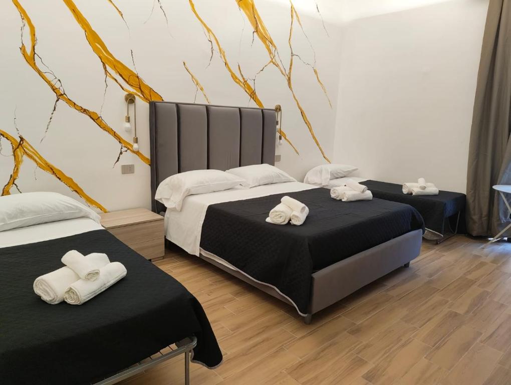 Posteľ alebo postele v izbe v ubytovaní Maison Arena