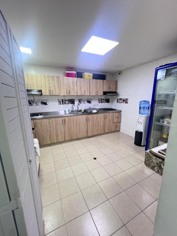 Kuchyň nebo kuchyňský kout v ubytování Garden Home Hostal