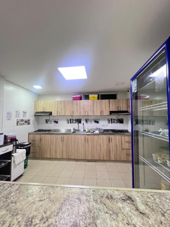 Kuchyň nebo kuchyňský kout v ubytování Garden Home Hostal