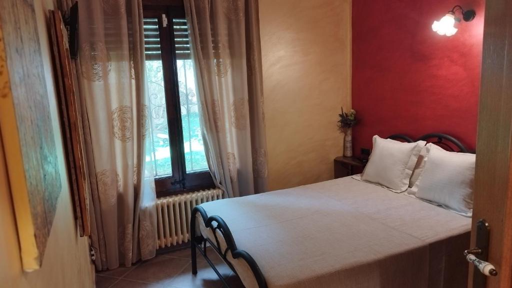 Postel nebo postele na pokoji v ubytování L´ARBOÇ