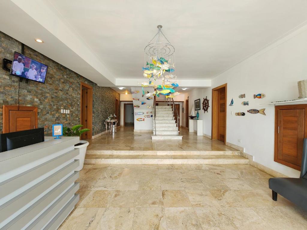 TV a/nebo společenská místnost v ubytování PENTHOUSE VUE MER - Boca Chica