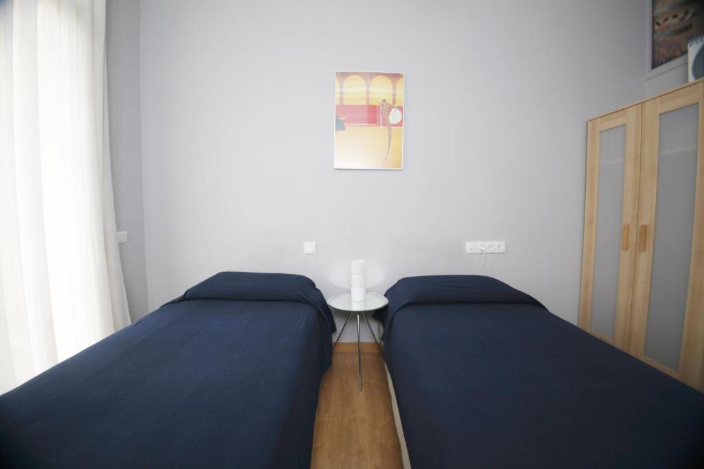 Posteľ alebo postele v izbe v ubytovaní Luxury Central Apartment