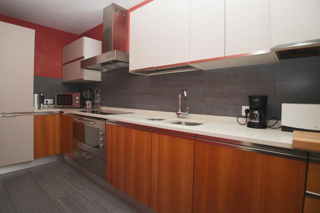 Kuchyňa alebo kuchynka v ubytovaní Luxury Central Apartment