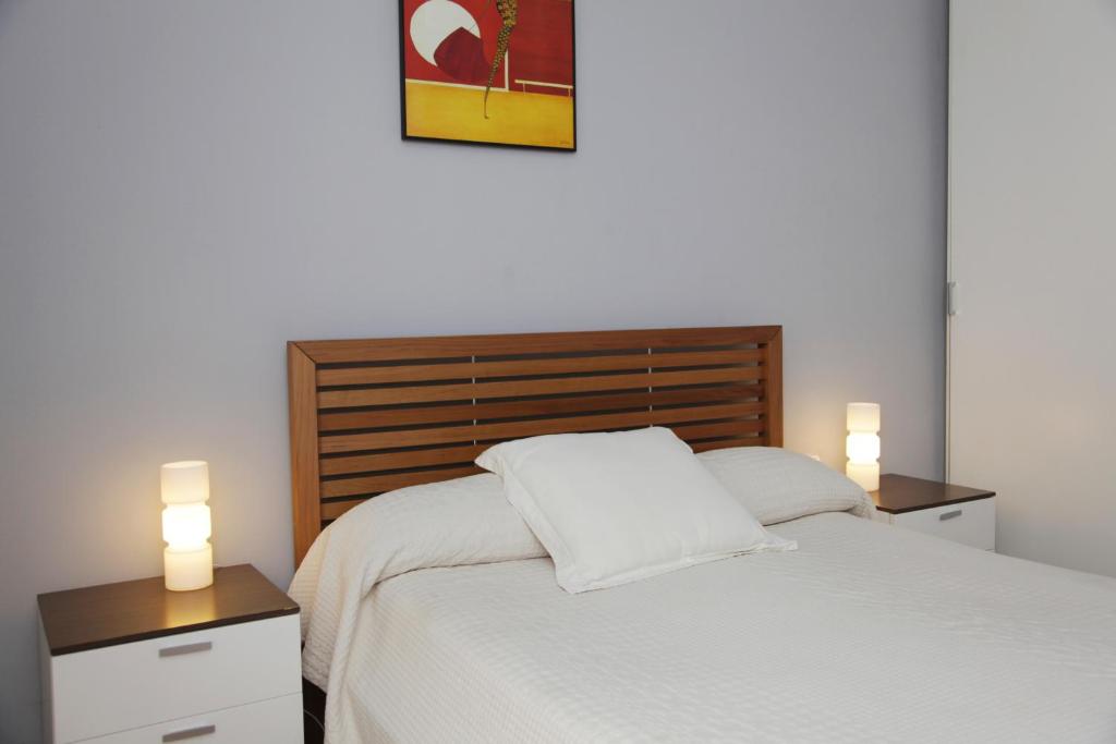 Posteľ alebo postele v izbe v ubytovaní Luxury Central Apartment