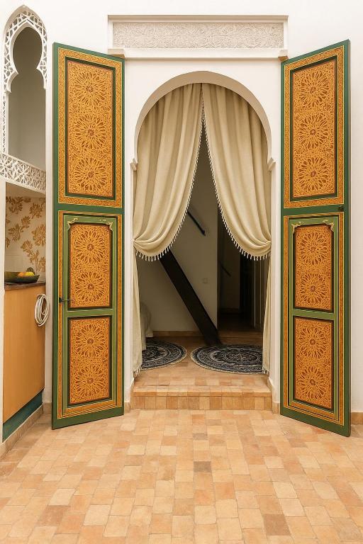 an entrance to a room with an open curtain at Dar Mohamadia in Fès