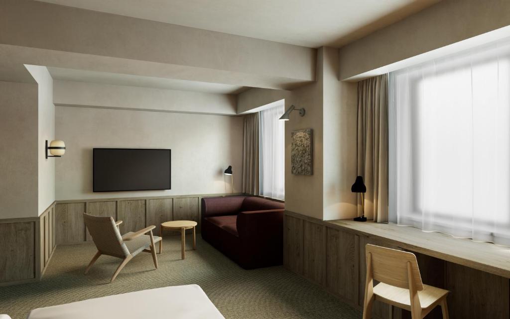 TV a/nebo společenská místnost v ubytování Hotel JAL City Toyama