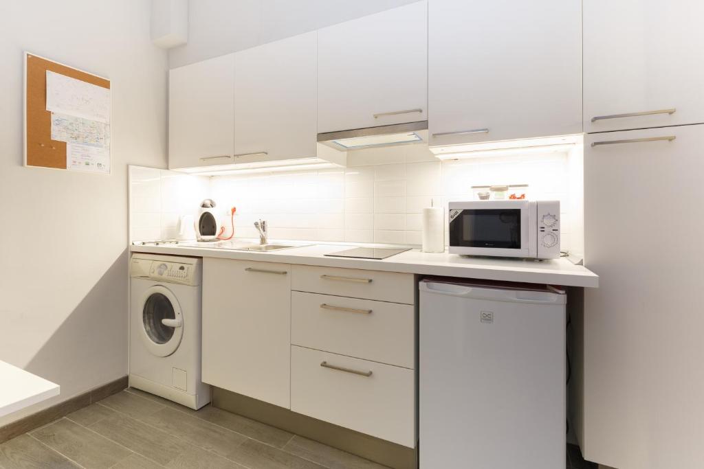 Kuchyňa alebo kuchynka v ubytovaní Poble Sec Apartment
