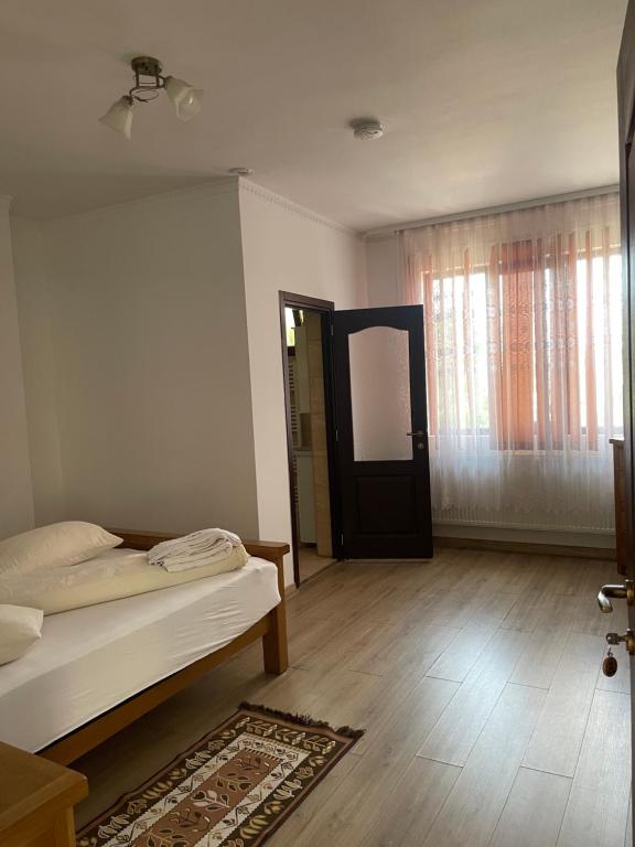 Postel nebo postele na pokoji v ubytování Casa Pop