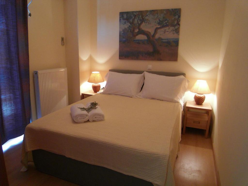 Postel nebo postele na pokoji v ubytování 4 Epohes